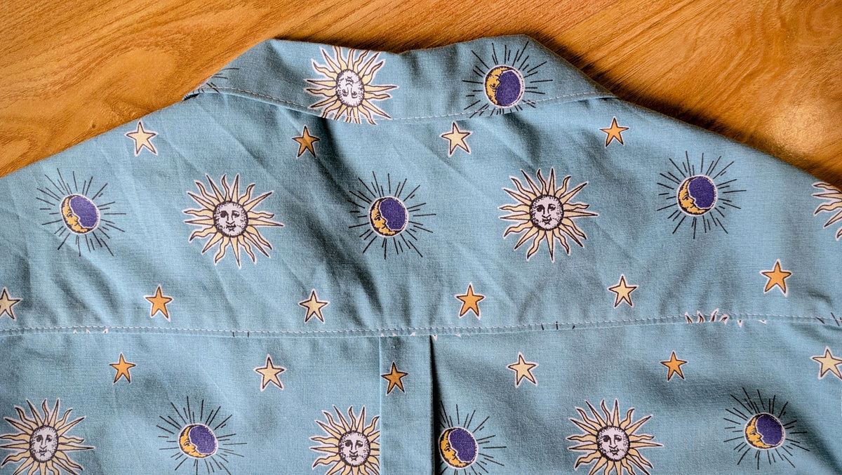 1990s Classic Cut Crop Upcycled Cotton Button-up Shirt – Celestial Sun & Moon (Light Blue / Size M) | First Gen Freedomfield