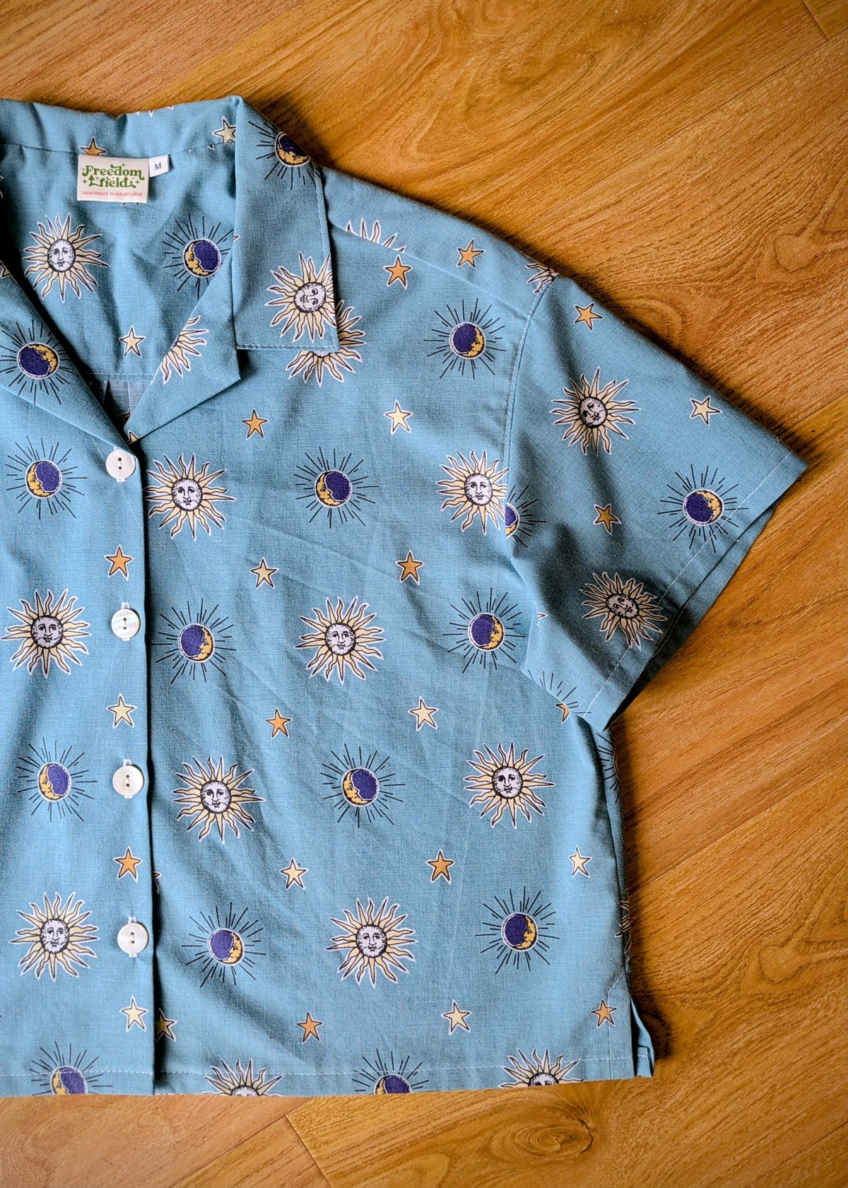 1990s Classic Cut Crop Upcycled Cotton Button-up Shirt – Celestial Sun & Moon (Light Blue / Size M) | First Gen Freedomfield